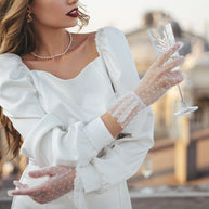 White sheer polka dot gloves with ruffle