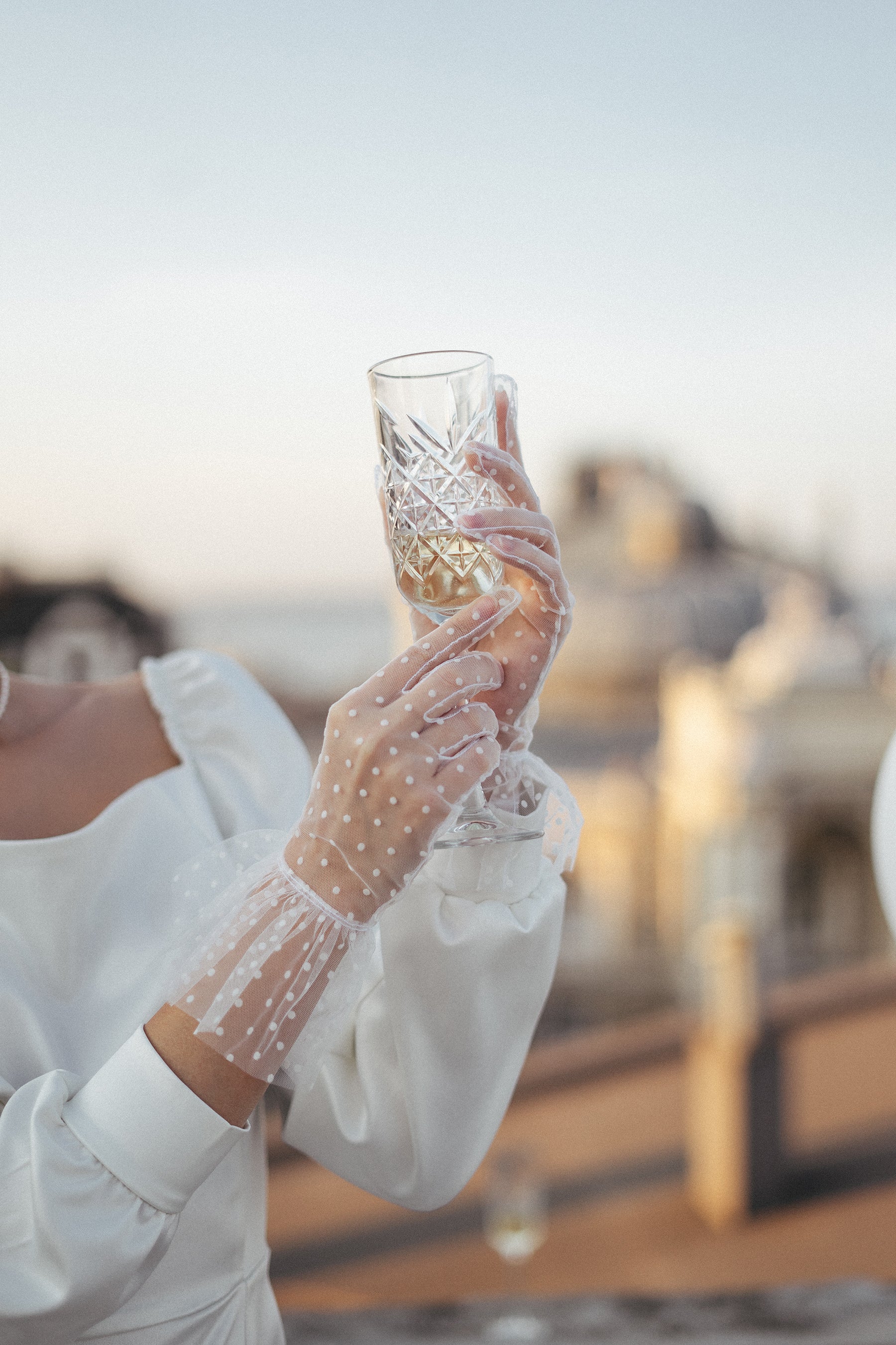 White sheer polka dot gloves with ruffle