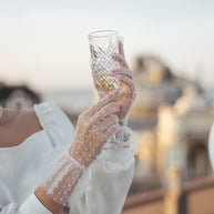 White sheer polka dot gloves with ruffle