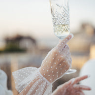 White sheer polka dot gloves with ruffle
