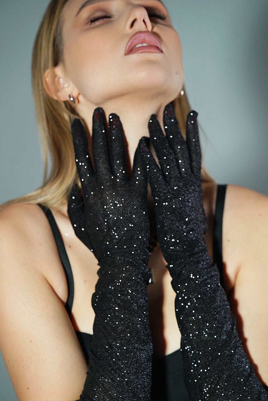 Elegance Unveiled: Black Shiny Glitter Gloves